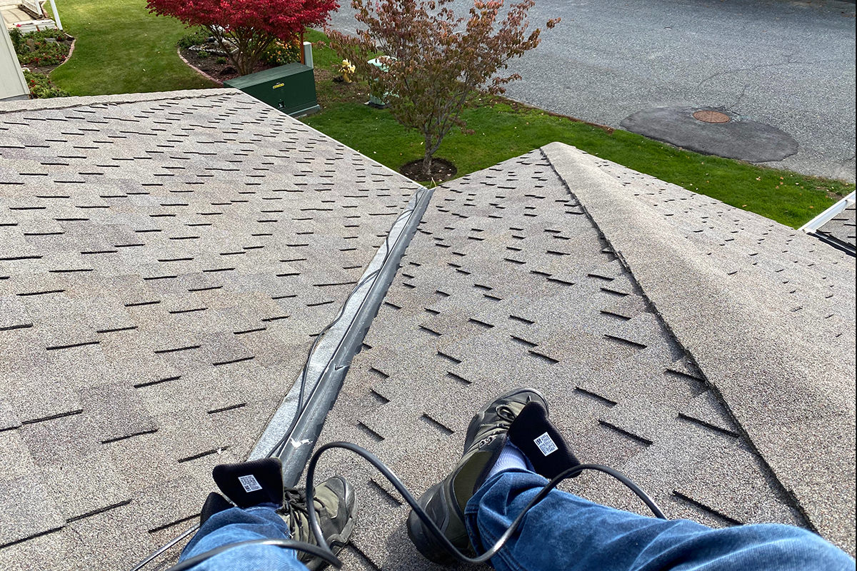 Me sitting on top of my roof