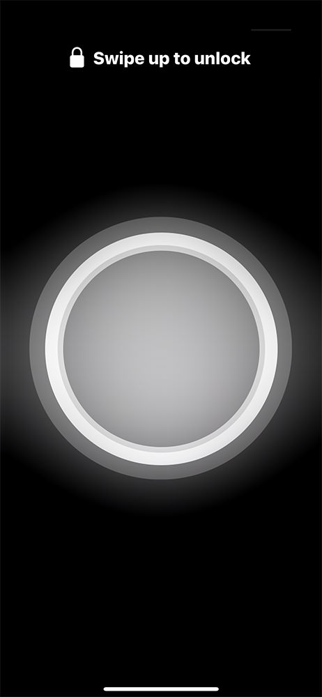 A glowing white ring appears on the iPhone display.