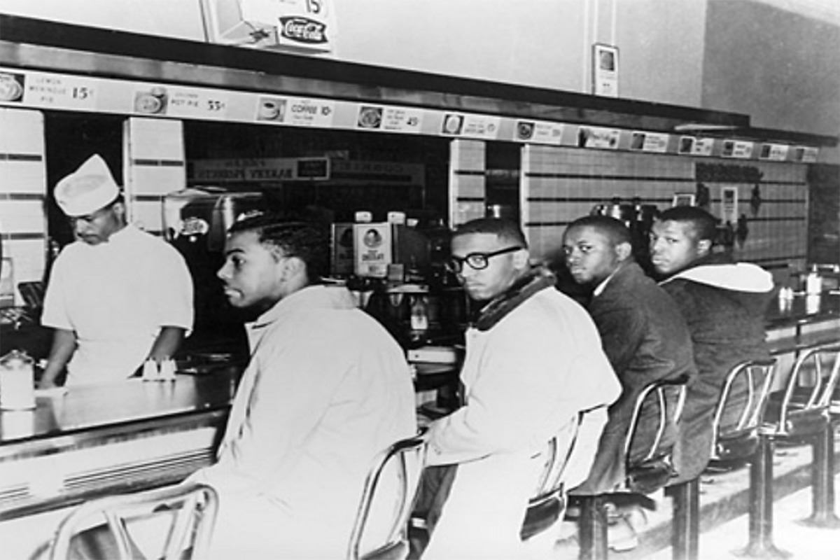 The Greensboro Four at the lunch counter at Woolworth's.