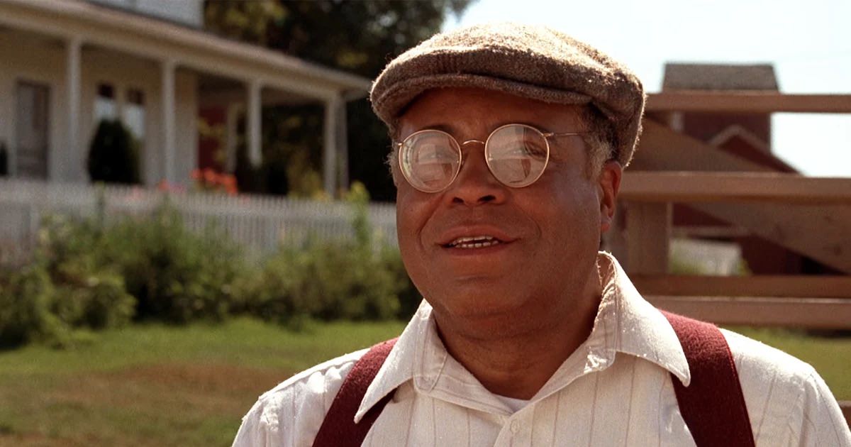 James Earl Jones looking out over a baseball field in a corn field in Iowa.