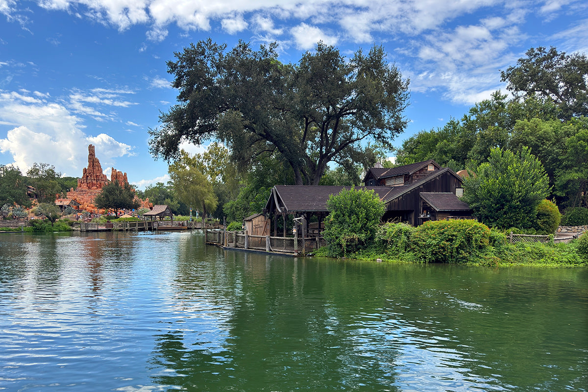 A look at Tom Sawyer Island over the edge of Rivers of America.