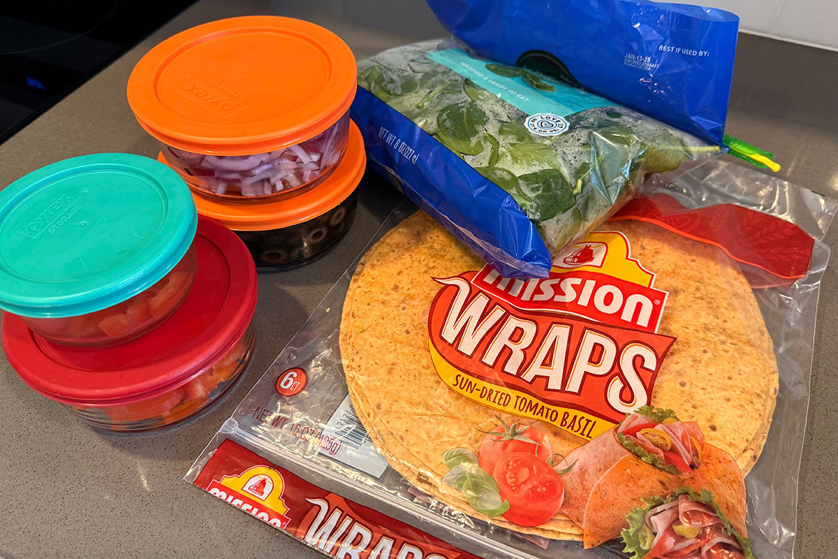 Wrap ingredients, all neatly cut up and stored in glass containers.