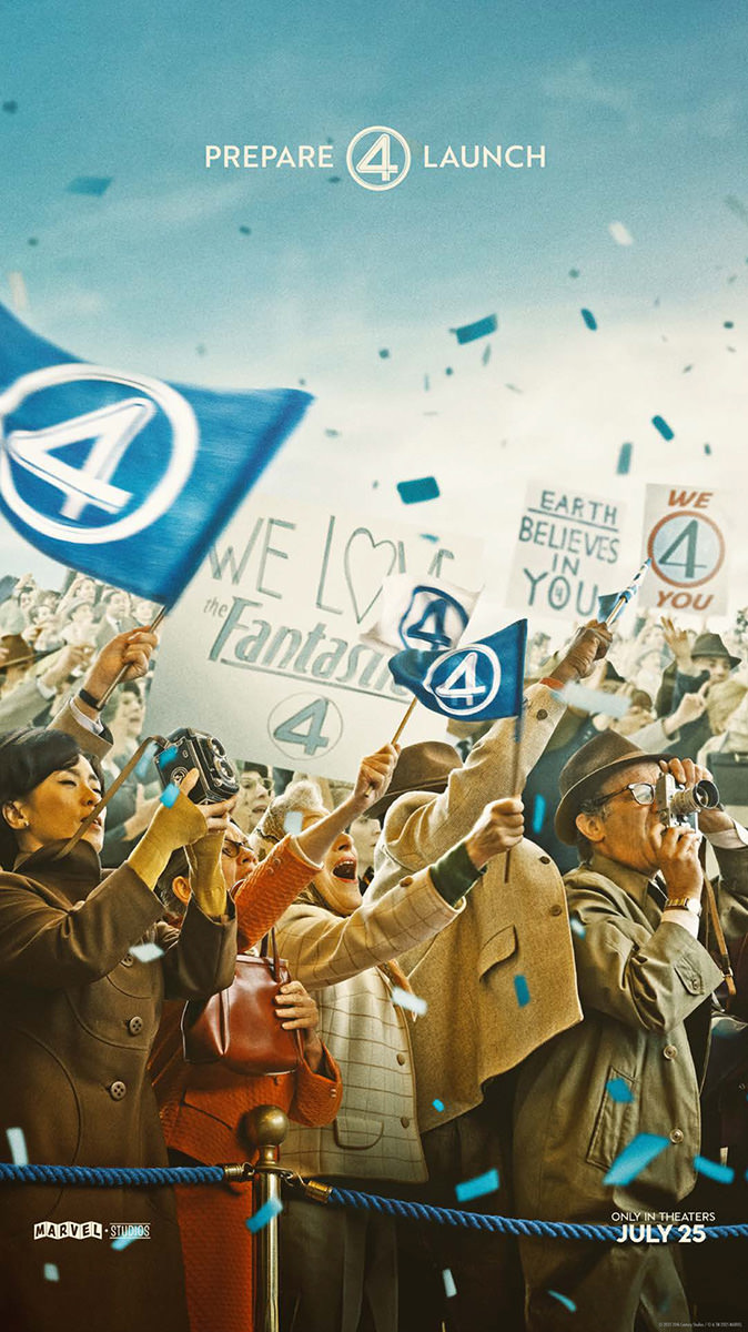 People in a crowd waving flags with the Fantastic Four logo.