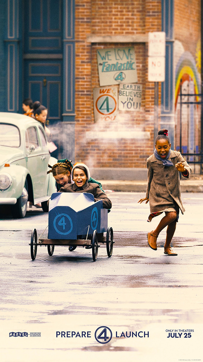 Kids playing with a push-cart painted to look like the Fantasticar.