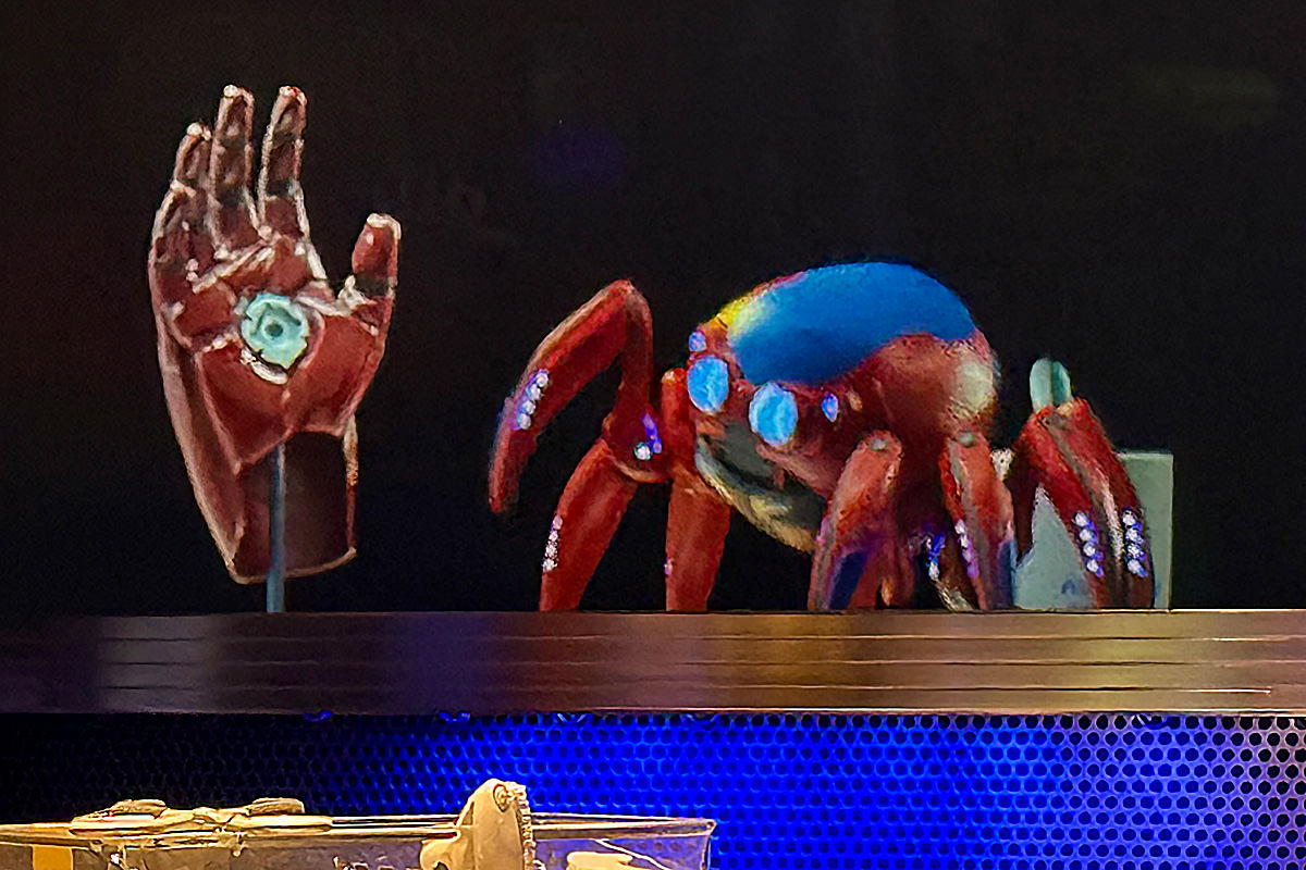 A spider-bot gets curious in the pre-show