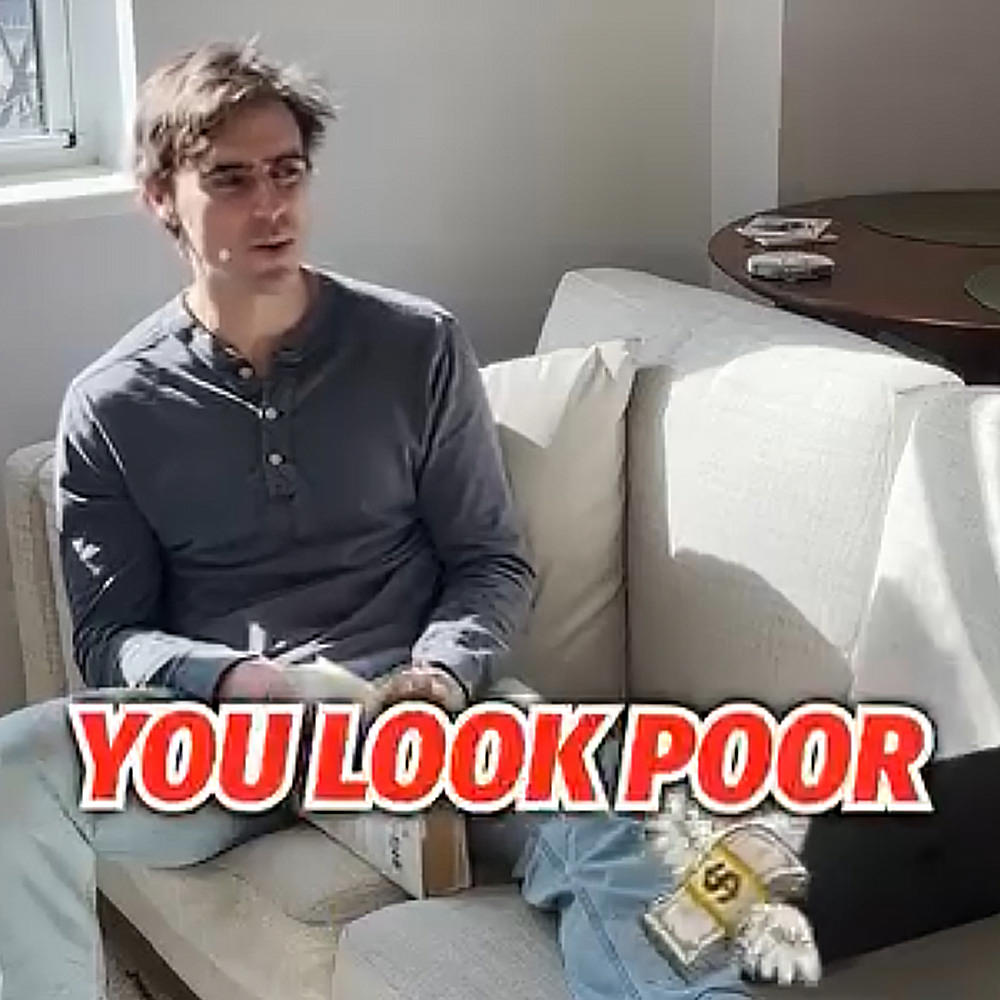 A guy sitting on a couch saying YOU LOOK POOR!